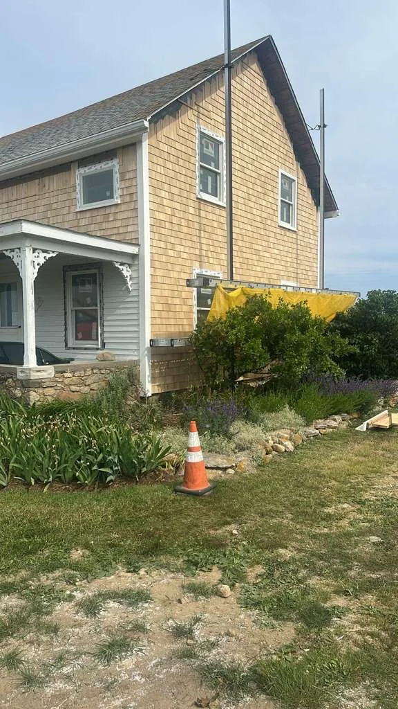 Completed covered front entry and steps