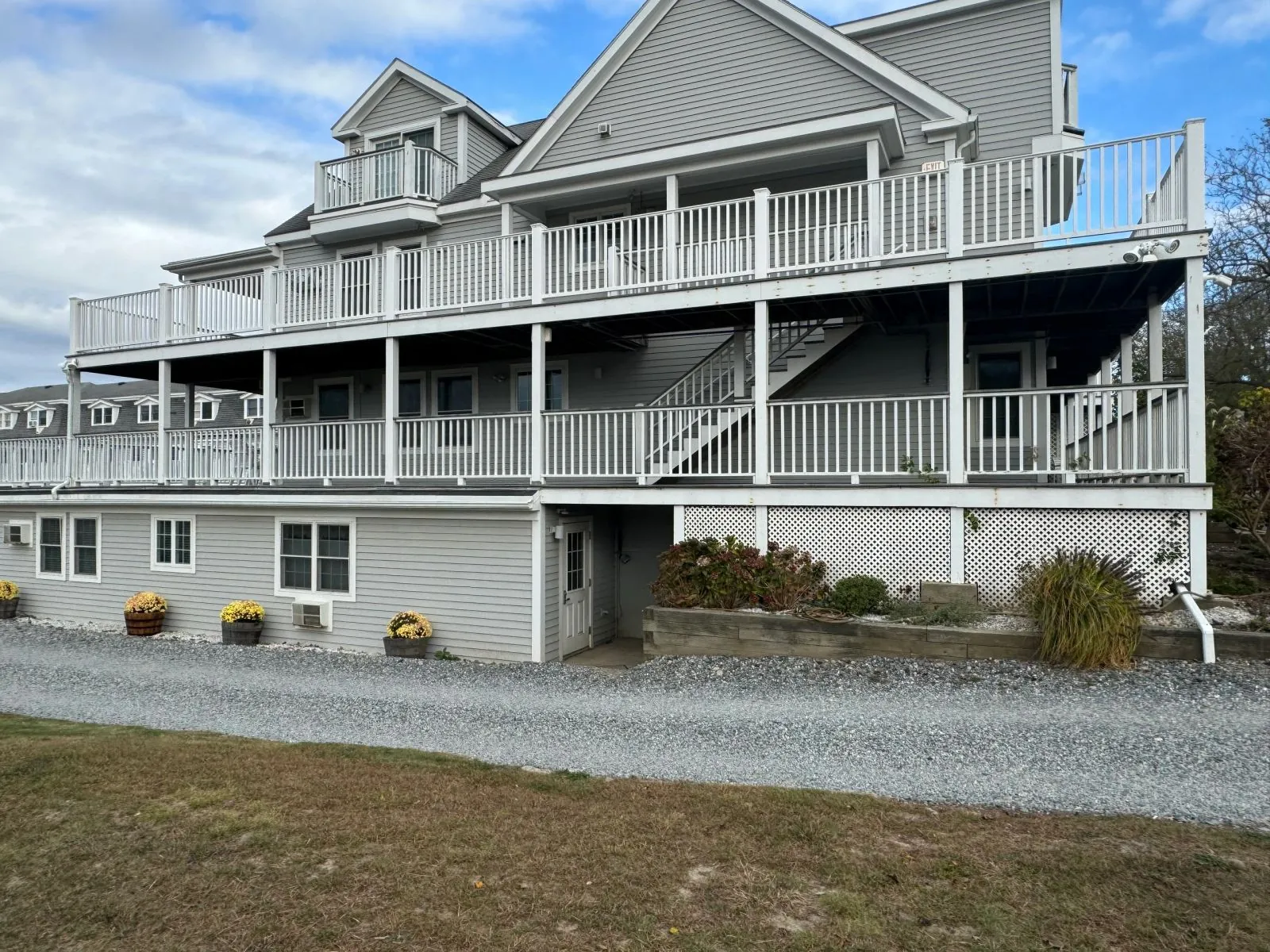 Completed coastal home exterior with extensive decks
